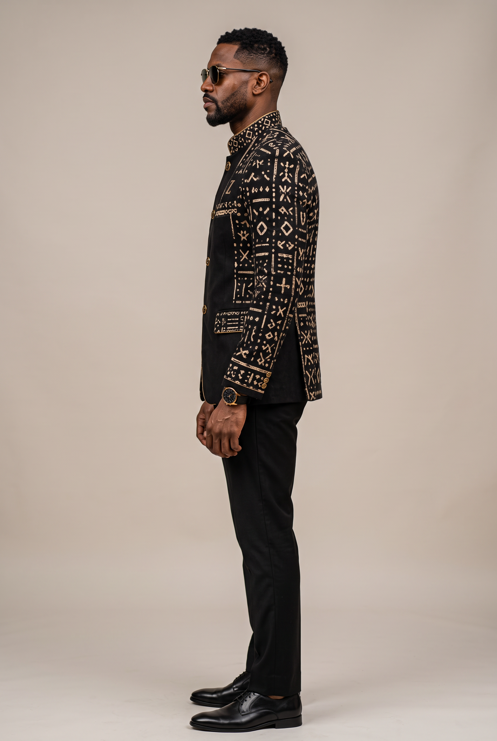 Bogolan Atelier Jacket · Onyx Black — Men, 02 Left (view 2 of 7). Left profile: shoulder line, sleeve fall and the outer seam trim.