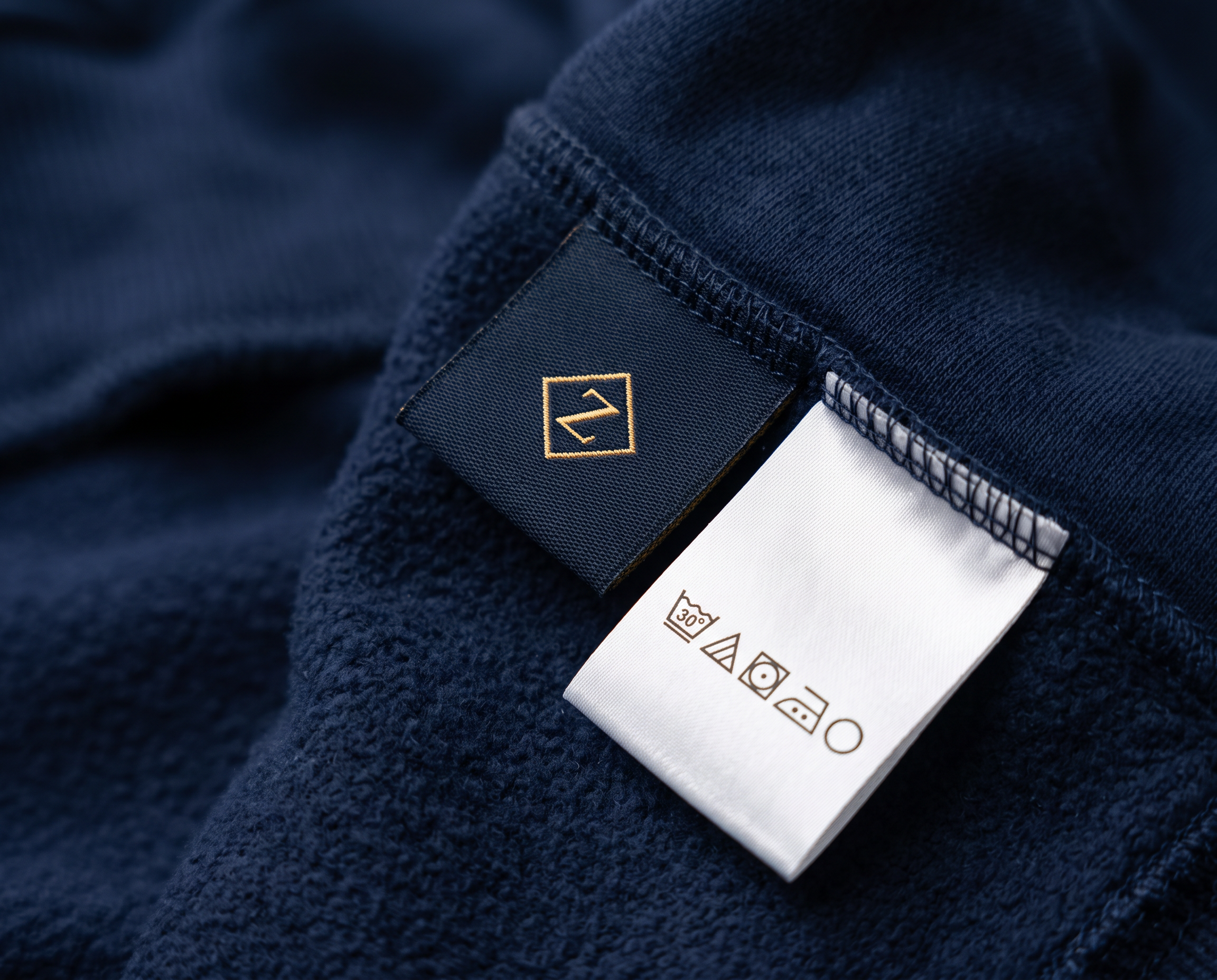 Bogolan Hoodie Set · Midnight Navy — Women, 06 Inner tags (view 6 of 7). Inner tags: size scale, atelier reference and care instructions.