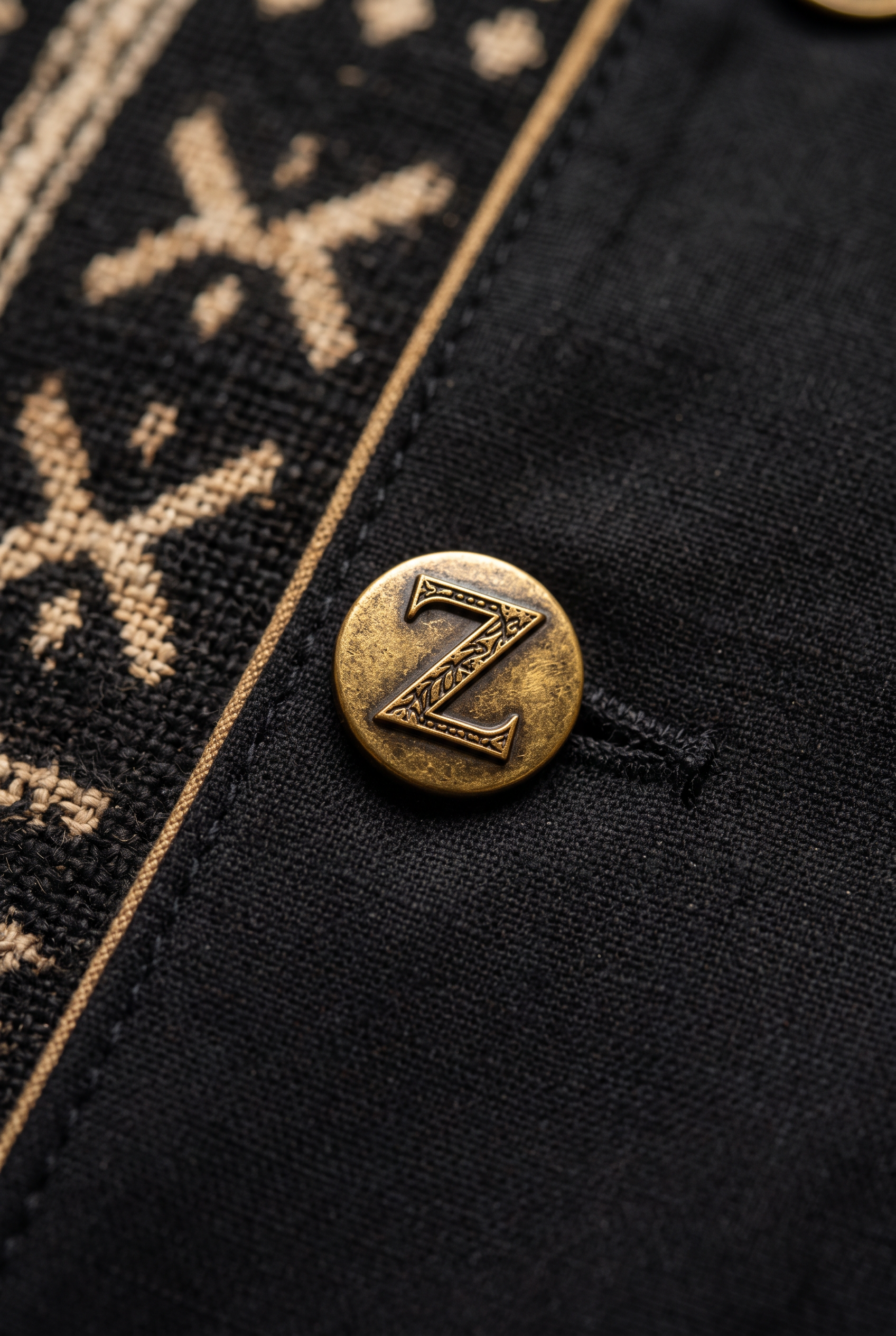 Bogolan Atelier Jacket · Onyx Black — Men, 07 Fabric detail (view 7 of 7). Fabric detail: close study of the cloth, hand-printed mudcloth motif and stitching.