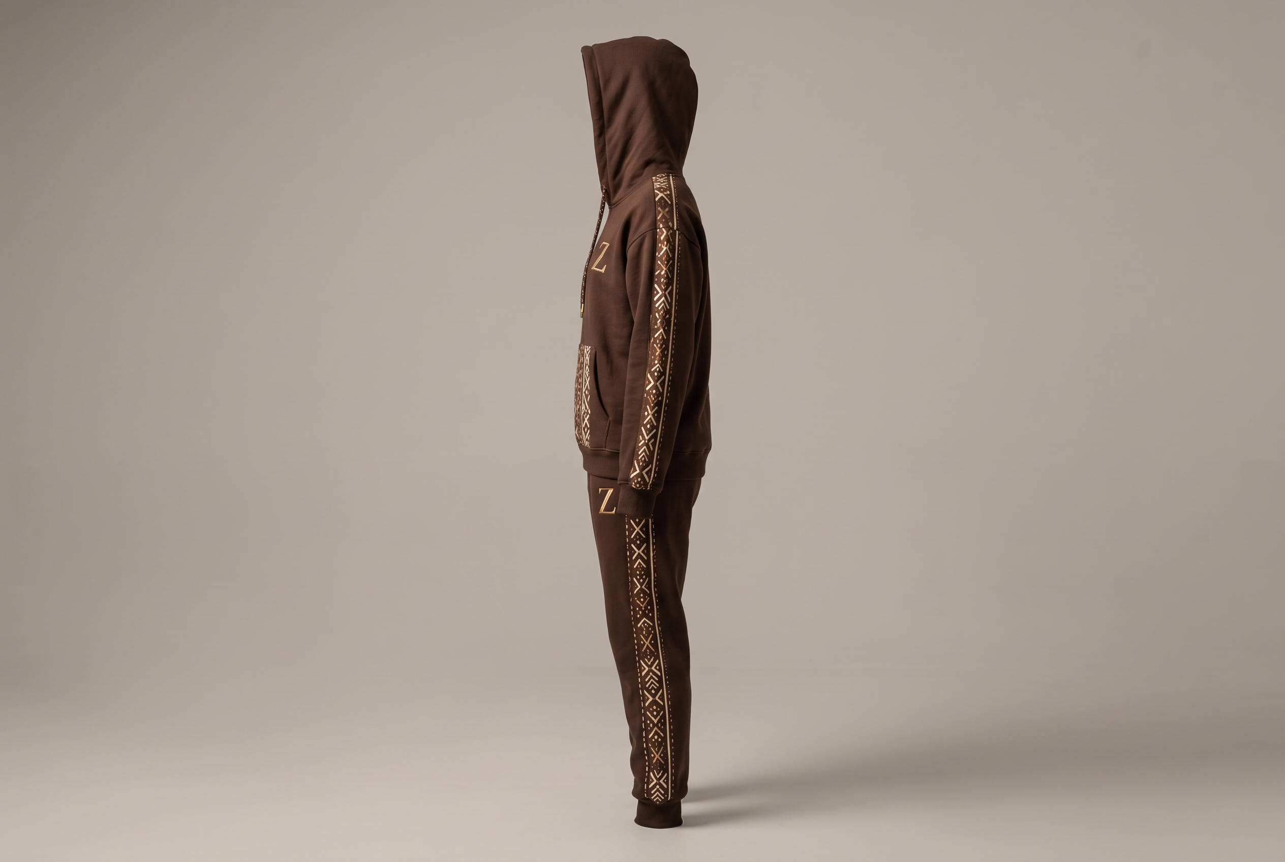 Bogolan Hoodie Set · Cocoa — Women, 02 Left (view 2 of 7). Left profile: shoulder line, sleeve fall and the outer seam trim.