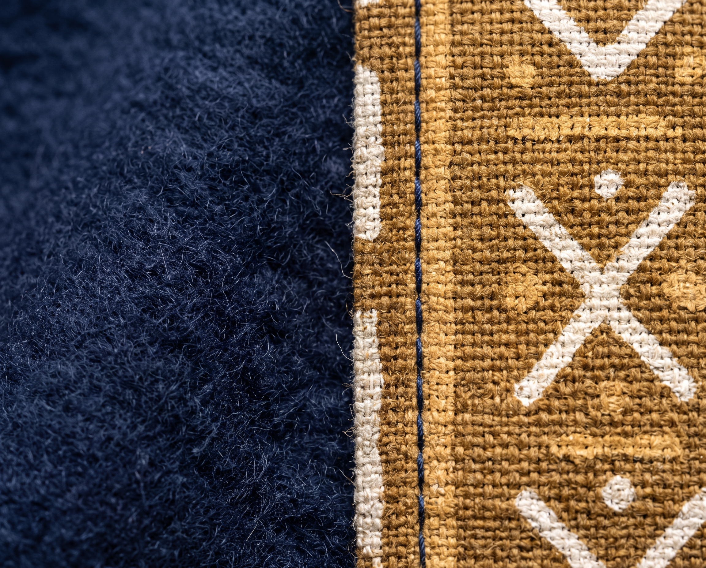 Bogolan Hoodie Set · Midnight Navy — Women, 07 Fabric detail (view 7 of 7). Fabric detail: close study of the cloth, hand-printed mudcloth motif and stitching.