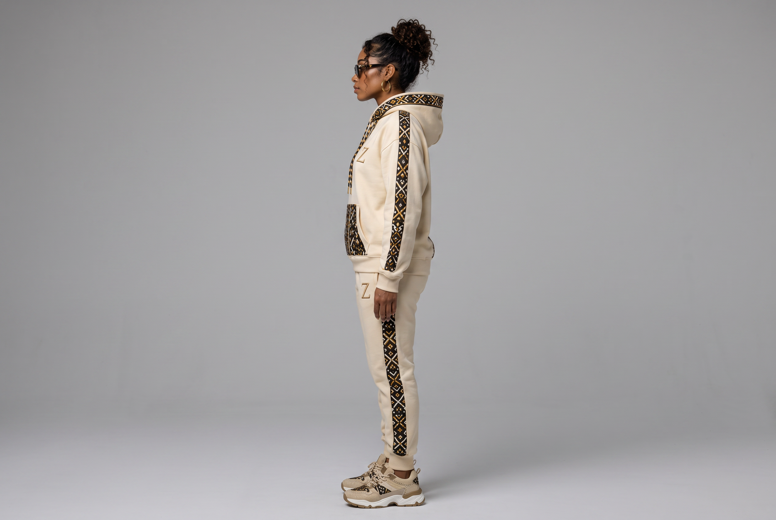 Bogolan Hoodie Set · Pearl Ivory — Women, 02 Left (view 2 of 7). Left profile: shoulder line, sleeve fall and the outer seam trim.