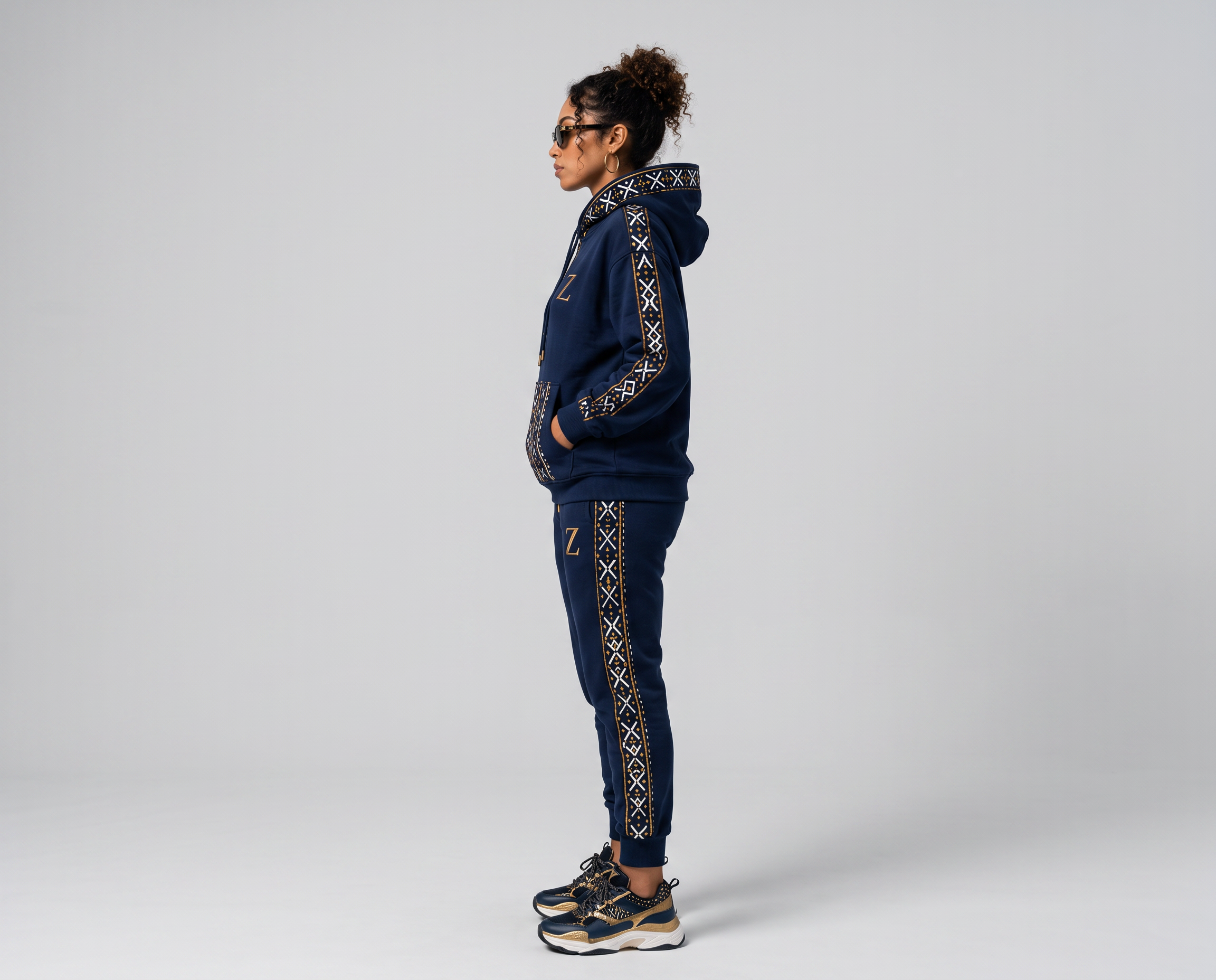 Bogolan Hoodie Set · Midnight Navy — Women, 02 Left (view 2 of 7). Left profile: shoulder line, sleeve fall and the outer seam trim.