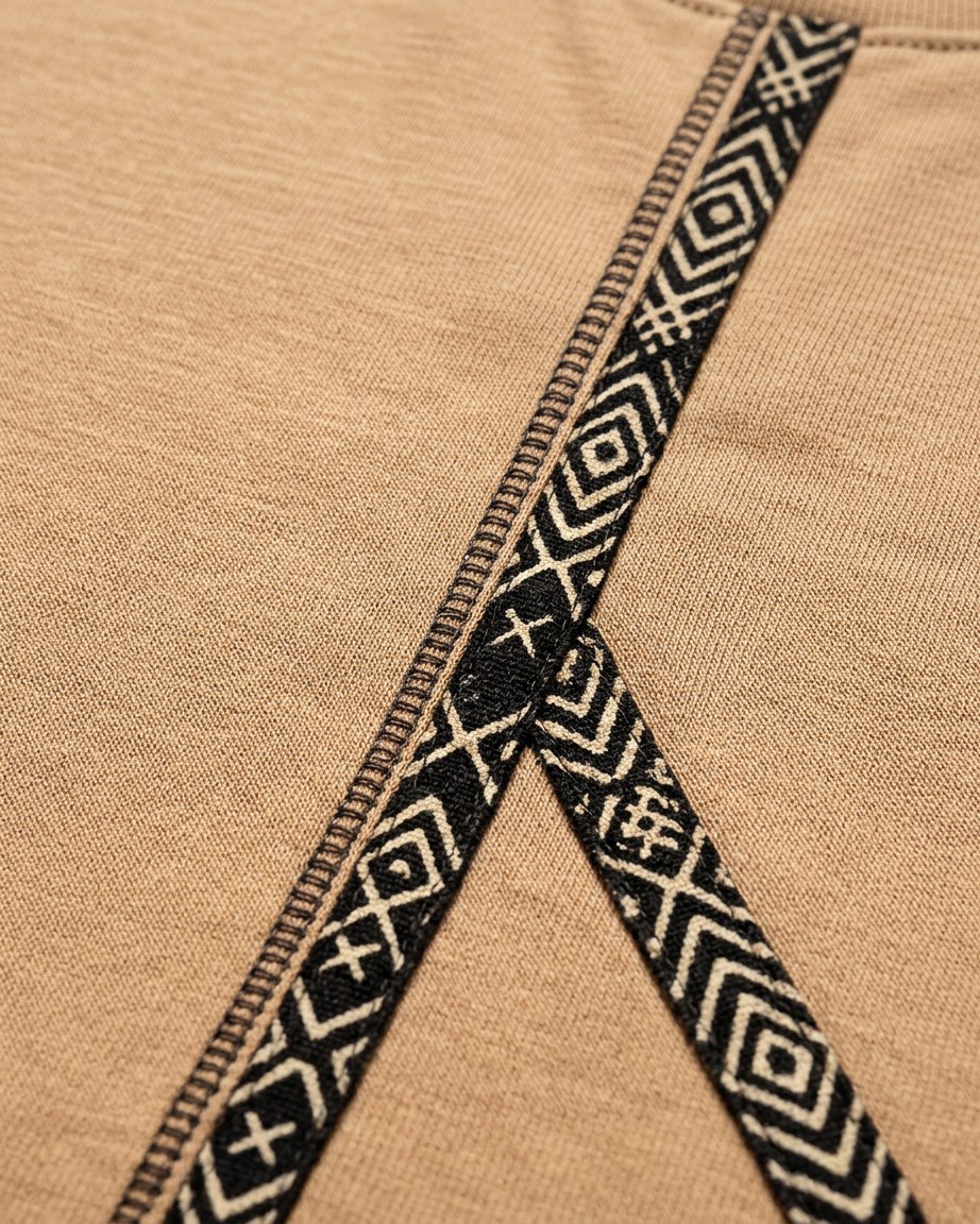 Desert Line Tee — Men, 07 Fabric detail (view 7 of 7). Fabric detail: close study of the cloth, hand-printed mudcloth motif and stitching.