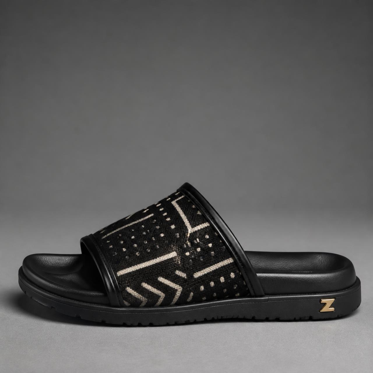 Triumph Bogolan Slide — Men — House · Z-Vibe Luxury Slippers™ seven-view specification plate; showing 01 Front, 02 Left, 03 Right, 04 Back, 05 Interior, 06 Inner tags, 07 Fabric detail. — 01 Front, Onyx / Ivory