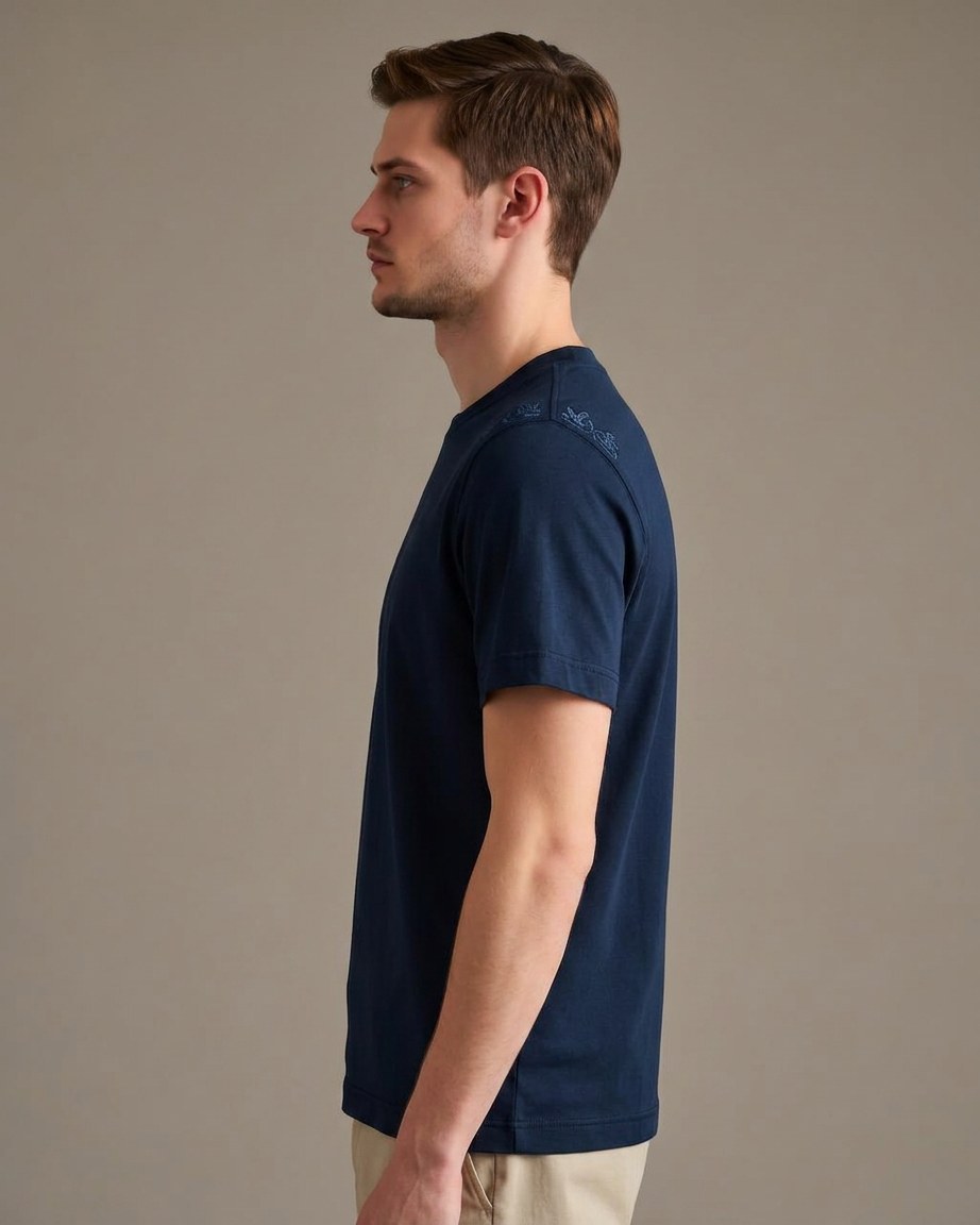 Navy Prestige Tee — Men, 02 Left (view 2 of 7). Left profile: shoulder line, sleeve fall and the outer seam trim.