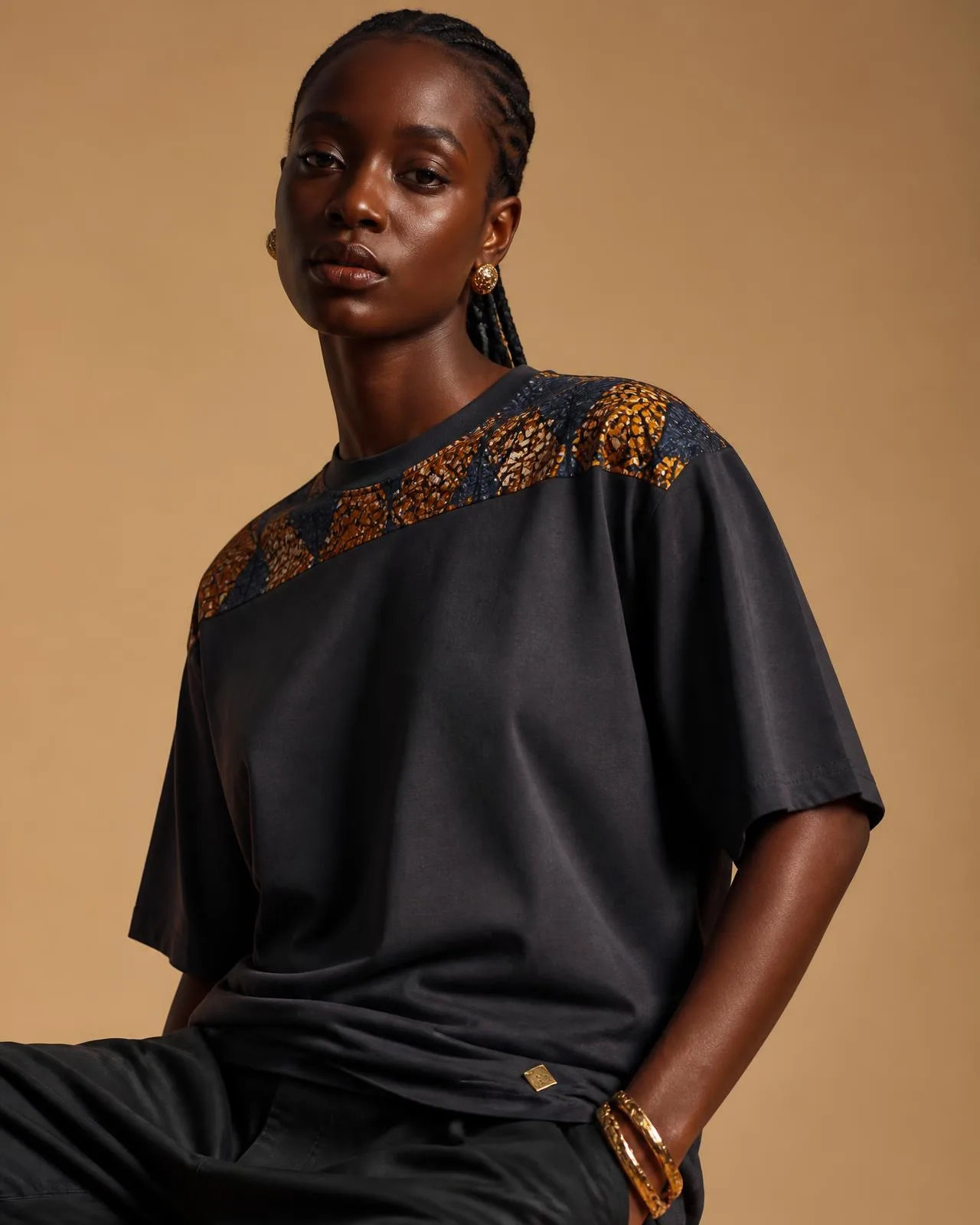 Z-Tee Femme™ — Softness with structure., finished with the house African heritage cloth signature