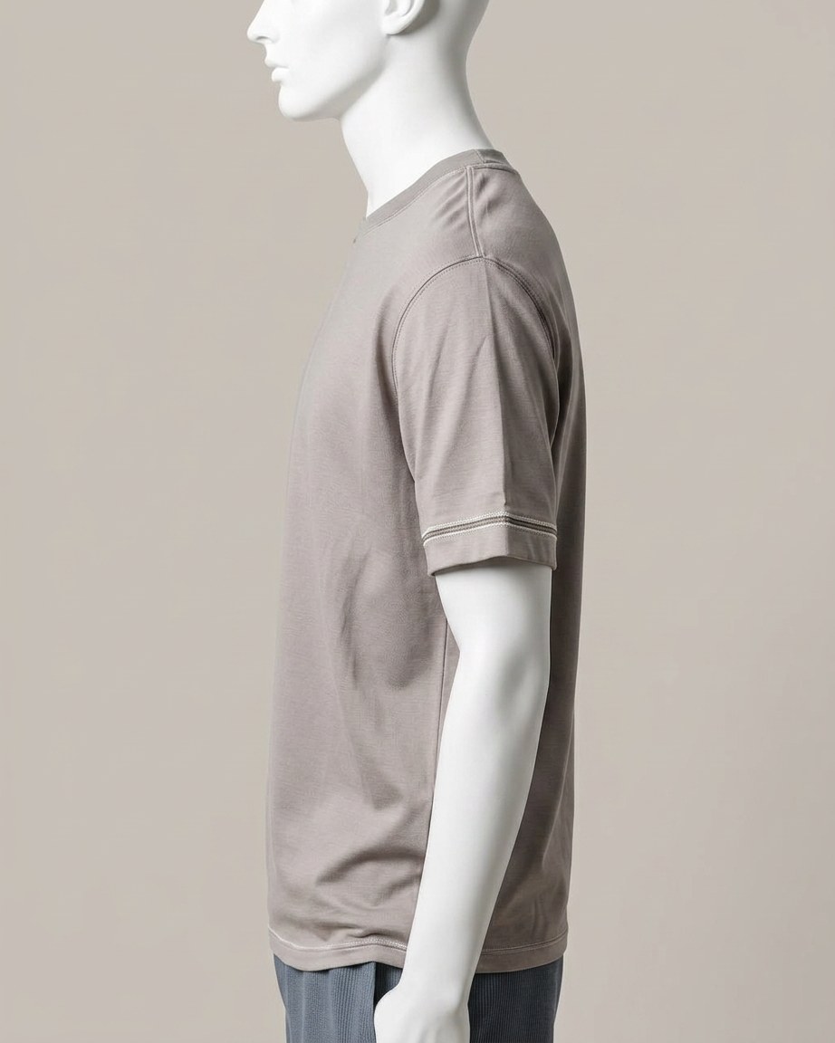 Stone Grey Tee — Men, 02 Left (view 2 of 7). Left profile: shoulder line, sleeve fall and the outer seam trim.