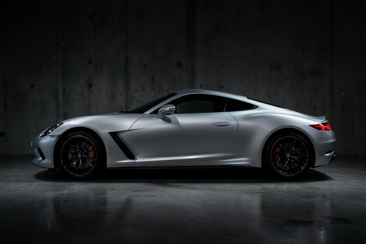 Silver Meridian Apex performance coupe photographed side-on in a concrete studio